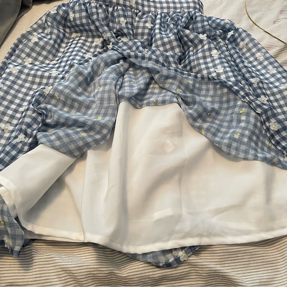 Unique Vintage Magnolia Place. Blue gingham knee-length skirt & sewn on flowers. - Picture 7 of 10